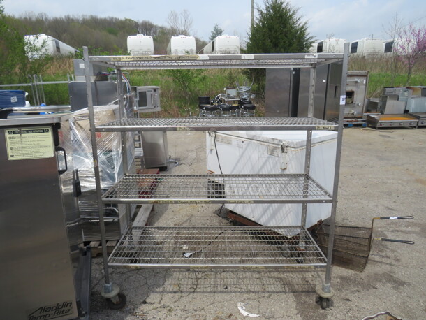 One Metro Shelf With 4 Shelves On Casters. 60X24X68.5 - Image 1 of 1