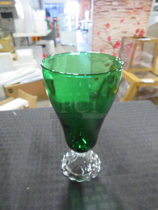 One Lot Of 8 Stem Glasses.