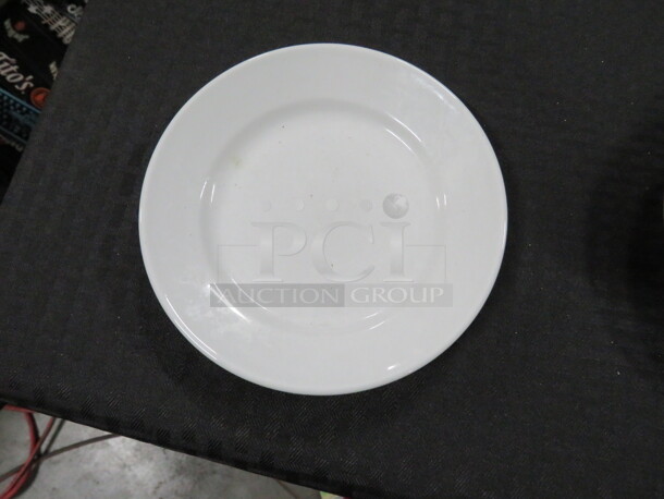 One Lot Of 7 White Plates.  - Image 1 of 1