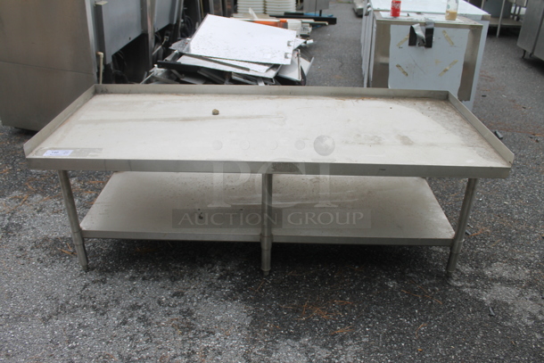 BRAND NEW SCRATCH AND DENT! Stainless Steel Commercial Equipment Stand w/ Back Splash and Under Shelf. - Image 1 of 3