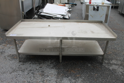 BRAND NEW SCRATCH AND DENT! Stainless Steel Commercial Equipment Stand w/ Back Splash and Under Shelf.