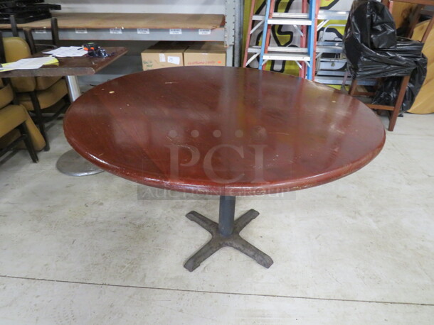 One 2 Inch Thick Solid Wooden Round Table Top On A Pedestal Base. 48X48X30