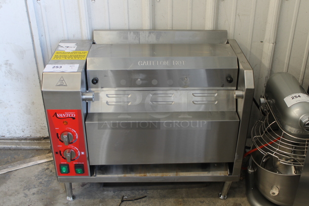 BRAND NEW SCRATCH AND DENT! Avantco 184BT18A Stainless Steel Commercial Countertop Contact Bun Toaster. 120 Volts, 1 Phase. Tested and Working! - Image 1 of 5
