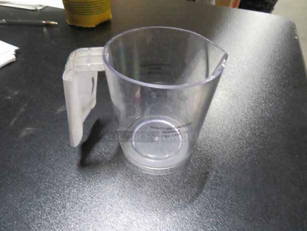 One Poly Measuring Cup.