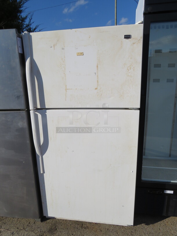 One Maytag Refrigerator/Freezer. 115 Volt. Model# M1TVEGMYW01. 33X30X65