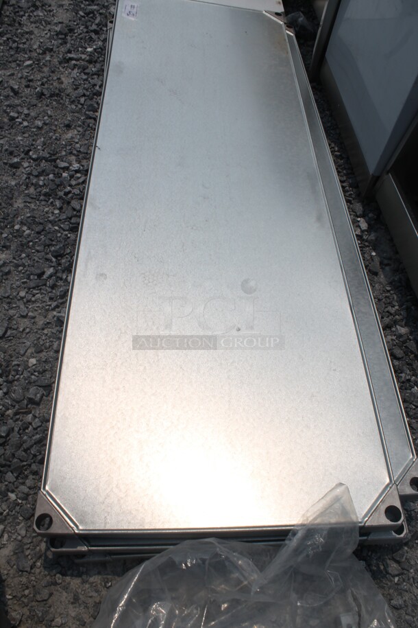 BRAND NEW SCRATCH AND DENT! Metro 2472FG Commercial Stainless Steel Flat Galvanized Steel Solid Shelf. - Image 3 of 4
