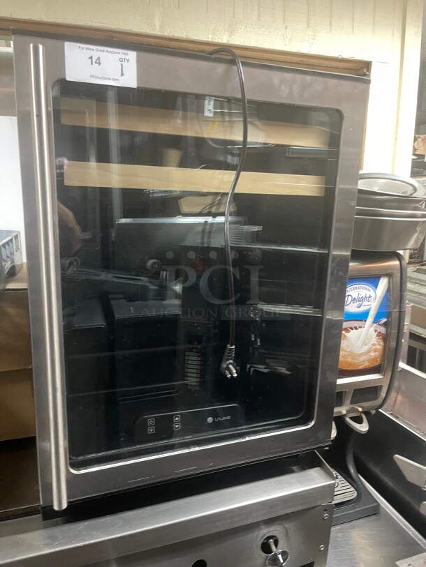 U-line 1175BEVS00 1000 Series
24 inch  Beverage Center with Dual Cooling Zones, 2 Beech-Trimmed Wine Racks, 2 Glass Shelves, Touch Pad Digital Controls and Glass Door 115 Volt NSF Tesed and Not getting Cold! - Image 2 of 8