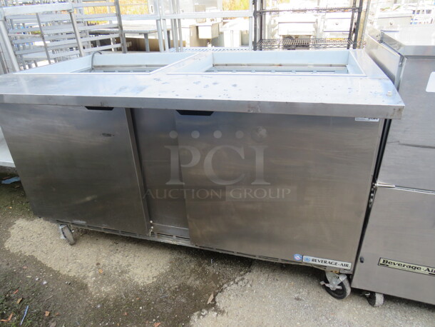 One Beverage Air 2 Door Prep Table On Casters. No Top. Model# SPE60-24M. 60X34X35. $5868.32 - Image 2 of 3