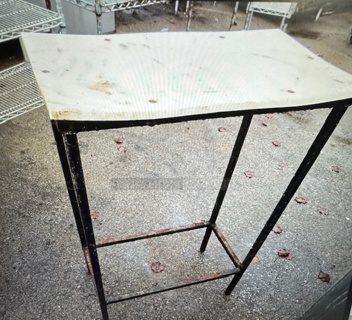 One Black Metal Stand With Cutting Board Top. 23X12.5X33