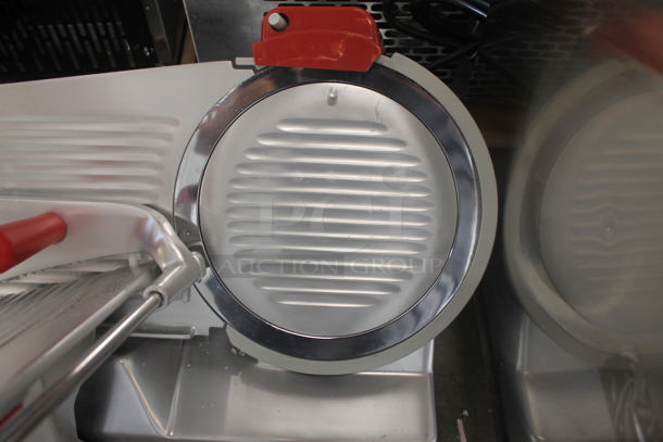 BRAND NEW SCRATCH AND DENT! 2022 Berkel B12-SLC Stainless Steel Commercial Countertop 12" Medium-Duty Gravity Feed Manual Meat Slicer w/ Blade Sharpener. 115 Volts, 1 Phase. Tested and Working! - Image 2 of 9