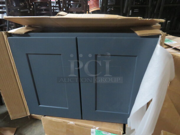 One NEW Echelon 2 Door, Cabinet In A Baltic Finish. #W2418BD.  - Image 1 of 2