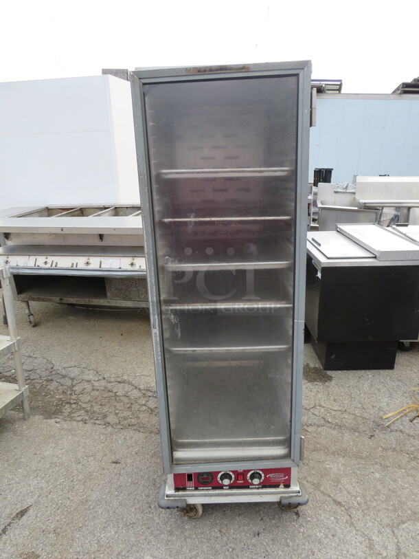 One Winholt Heater/Proofer With 6 Full Sheet Pans On Casters. 120 Volt. Model# NHPL-1836CA/2C. NOT Working. 21X32X66.5 - Image 1 of 2