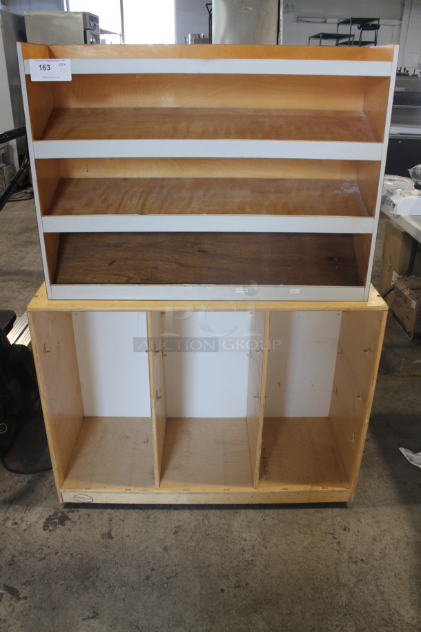 2 Piece Set Of Cabinets With Open Base, 1 Wooden, and 1 Wooden With White Trim Shelves and Blue Sides. 37x9x27 And 41x17.5x31
