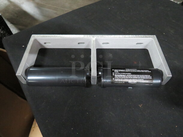 One NEW Bobrick Dual Toilet Paper Holder.  - Image 1 of 1
