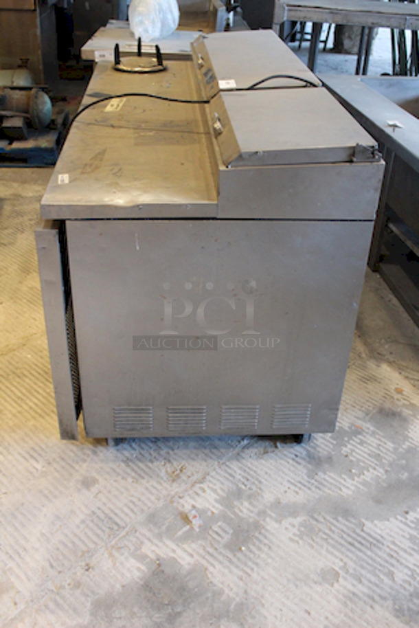 OUTSTANDING!! True TPP-67 67" Pizza Prep Table w/ Refrigerated Base, 115v, On Commercial Casters. 
Tested. Turned On. Got Cold.
67-1/4x32-1/2x42  115 V, 60 Hz, 1 ph - Image 3 of 5