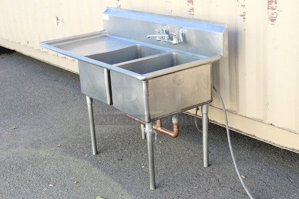 OUTSTANDING! 62” (2) Compartment Sink With Drainboard And Plumbing. Compartment Dimensions 17x23x12. Overall Dimensions 62x28x44 - Image 3 of 5