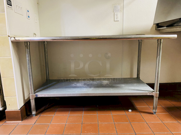 LIKE NEW! Duke Manufacturing DC-7291 60" Heavy Duty Stainless Steel Work Table W/ Galvanized Steel Under-Shelf.

60x30x34-1/2

 - Image 2 of 3