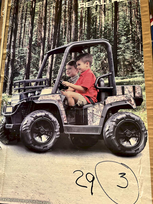 IN THE BOX! Dyncraft Realtree 24V UTV - Black. Realistic UTV Sounds, Suspension spring, Working Headlights, MP3 Input, Front Rack. - Image 1 of 6