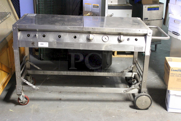 SWEET! Grand Cafe BBQ Grill model CGE06ALP, Propane, 116000BTU. Fully Functional. On HD Commercial Casters. Missing Grate on the Left Side and Some Of The Knobs. 
65-1/2x24-1/4x37