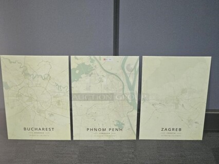 ALL ONE MONEY Tin Map art set. Features 3 tin maps with coordinates for Bucharest, Romania- Phnom Penh, Cambodia- and Zagreb, Croatia. Each tin is 18” H x 12.5” W.  

 