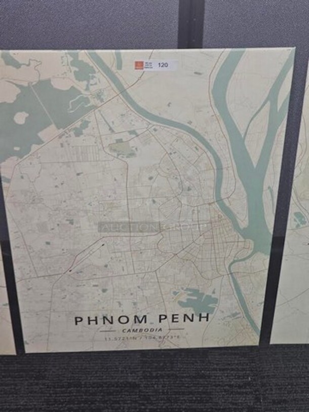 ALL ONE MONEY Tin Map art set. Features 3 tin maps with coordinates for Bucharest, Romania- Phnom Penh, Cambodia- and Zagreb, Croatia. Each tin is 18” H x 12.5” W.  

  - Image 3 of 3