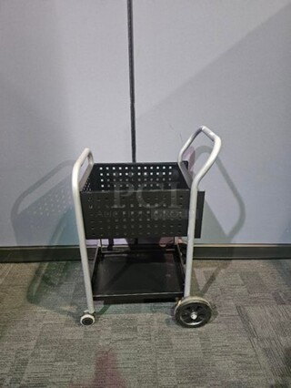 Silver and black metal filing cart in great condition. Signs of minor use/ small scratches here or there. 26.5” H x 16.5” W