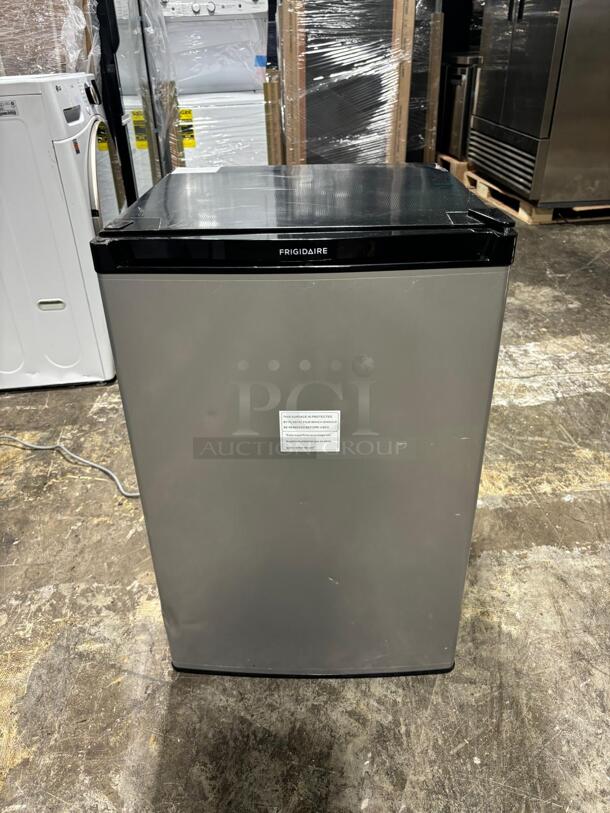 Brand New scratch & dent Frigidaire FFPE4533UM 22 Inch Compact Refrigerator with 4.5 cu. ft. Capacity, 2 Glass Shelves, 3 Door Racks, Built-in Can Dispenser, Reversible Door Swing and ENERGY STAR Qualification: Silver Mist - Image 5 of 6