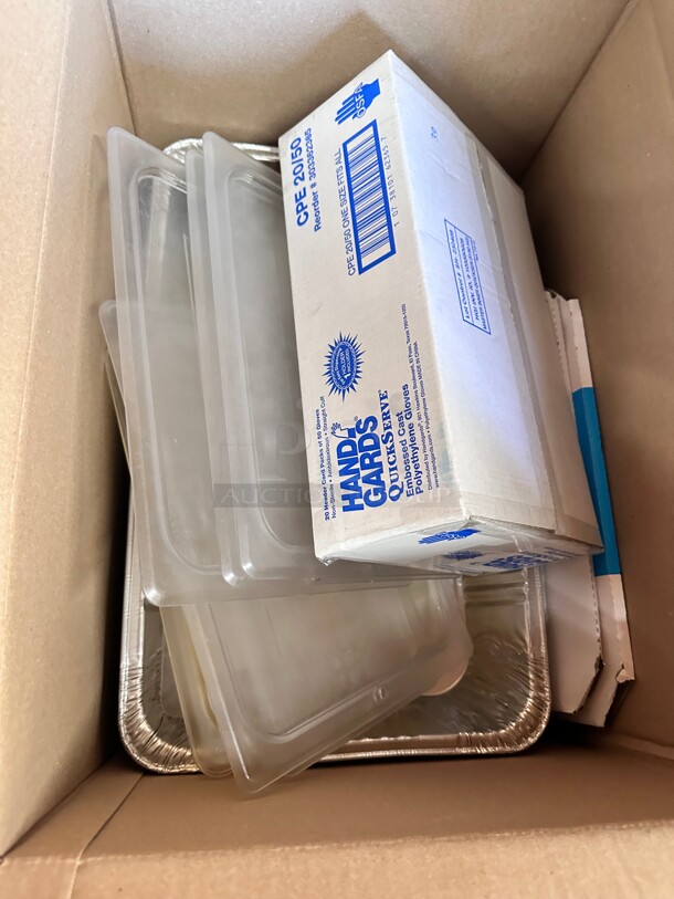One Lot A Box Contains Cloves and Plastic  Covers - Image 1 of 3