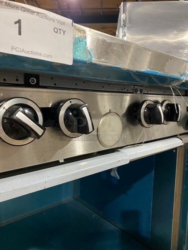WOW! NEVER USED! Garland Commercial Natural Gas Powered 4 Burner Stove With Right Side Flat Griddle! Griddle Has Back And Side Splashes! With 2 Compartment Storage Space Underneath! All Stainless Steel! On Casters! Model: G604G36SS SN: 1712100102342 - Image 10 of 12