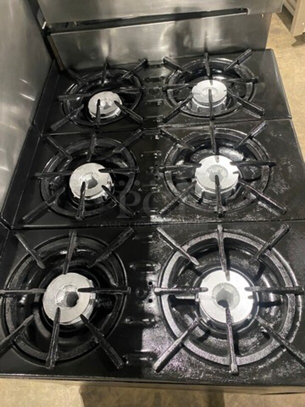 FAB! Franklin Commercial Natural Gas Powered 6 Burner Stove With Right Side Flat Griddle And Cheese Melter Combo! Griddle Has Side Splashes! With Raised Back Splash And Salamander Shelf! With Single Small Door Storage Space! With Oven Underneath! Metal Oven Racks! All Stainless Steel! On Legs! - Image 5 of 12