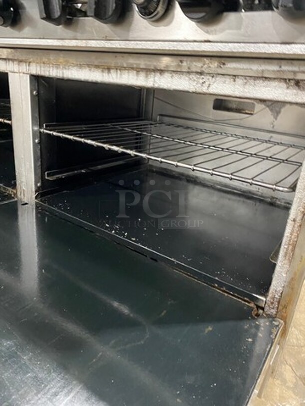 American Range Commercial Natural Gas Powered 10 Burner Stove! With Raised Back Splash! With 2 Full Size Oven Underneath! Metal Oven Racks! All Stainless Steel! On Casters! - Image 8 of 10