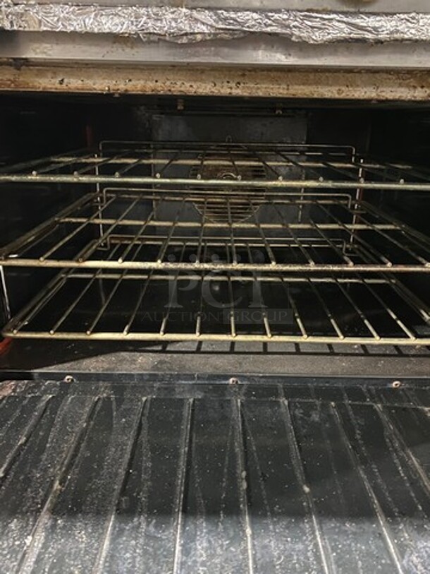 Garland Natural Gas Powered 10 Burner Stove! With 2 Full-Sized Convection Ovens! With Metal Oven Racks! With Raised Back Splash & Salamander Shelf! Stainless Steel! On Casters! WORKING WHEN REMOVED! - Image 5 of 11