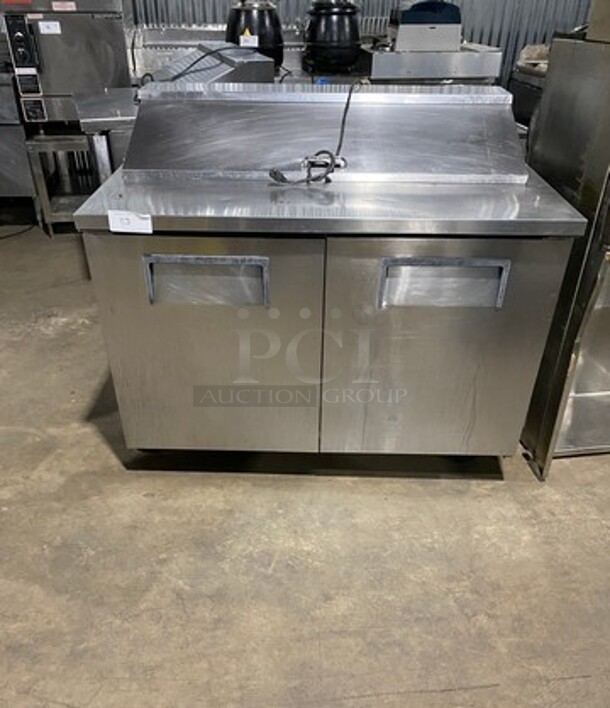True Commercial Refrigerated Sandwich Prep Table! With 2 Door Underneath Storage Space! Poly Coated Racks! All Stainless Steel! On Casters! Model: TSSU4812 SN: 7254731 115V 60HZ 1 Phase