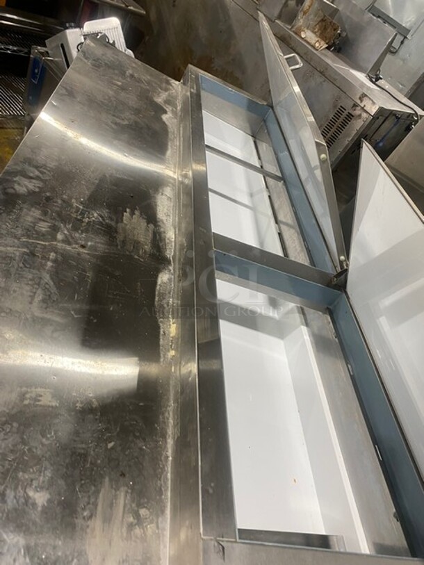 Sweet! LATE MODEL! Central Commercial Refrigerated Pizza Prep Table! With Full Length Removable Cutting Board! With 2 Door Refrigerated Storage Underneath! With Poly Coated Racks! 115V 1 Phase! Model: 69K014 SN: 8060492! On Commercial Casters! Working When Removed!  - Image 10 of 12