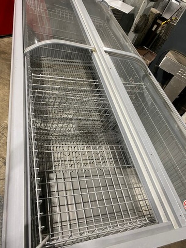2016 AHT Chest Freezer Merchandiser! Model Manhattan210VS Serial 34990700000059! 110-120V 1Phase! With Baskets! One Glass Door Missing! On Legs!
 - Image 5 of 9