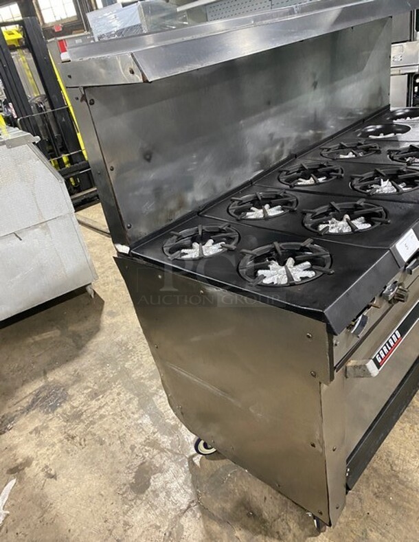 Garland Commercial Natural Gas Powered 12 Burner Stove! With 2 Full-Sized Ovens! With Metal Oven Racks! With Raised Back Splash & Salamander Shelf! Stainless Steel! On Casters! - Image 4 of 9