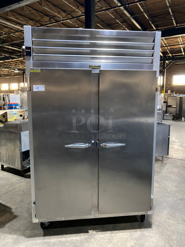 Traulsen 2 Door Reach In Freezer Unit! With Poly Coated Racks! All Stainless Steel! On Casters! Works Great! Model: G22010 SN: T170039I11 115V 60HZ 1 Phase