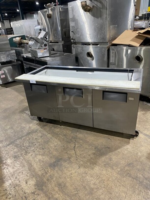 True Commercial Refrigerated Sandwich Prep Table! With Commercial Cutting Board! With 3 Door Underneath Storage Space! All Stainless Steel! On Casters! Model: QA7230MB SN: 13758551 115V 1 Phase