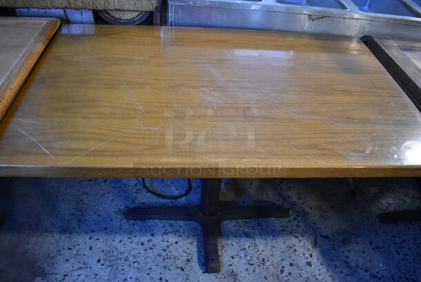 2 Wood Pattern Tables on Black Metal Table Base. 46x28x29.5. 2 Times Your Bid!