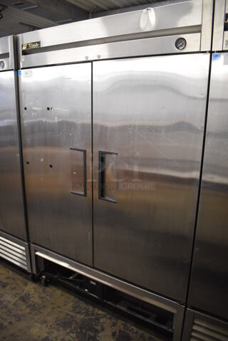 2013 True T-49F ENERGY STAR Stainless Steel Commercial 2 Door Reach In Freezer w/ Poly Coated Racks on Commercial Casters. 115 Volts, 1 Phase. 54x30x83. Tested and Working!