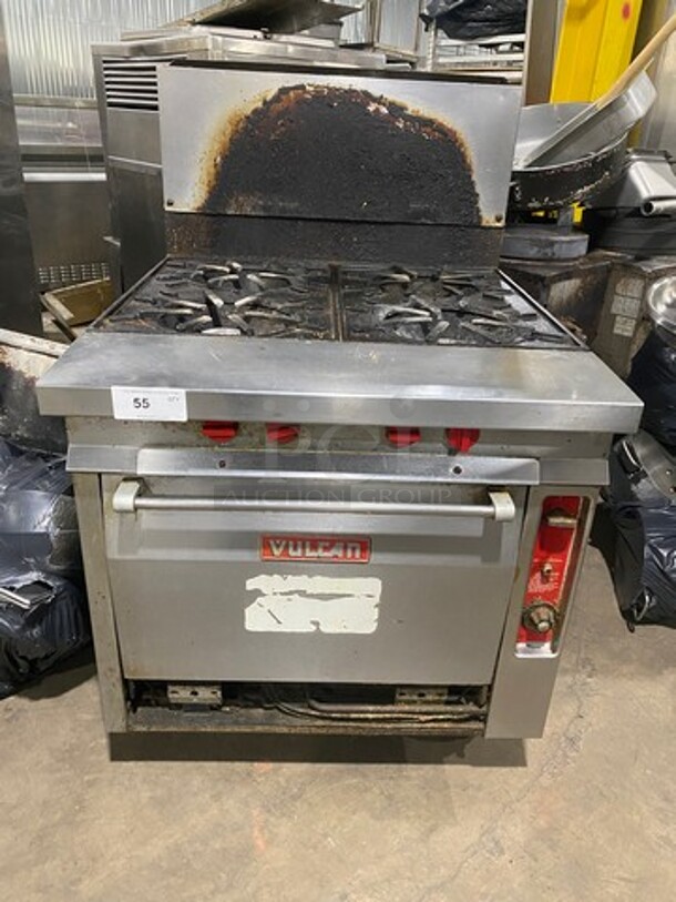 Vulcan Natural Gas Powered 4 Burner Stove! With Oven Underneath! With Raised Backsplash! All Stainless Steel! On Casters! WORKING WHEN REMOVED!