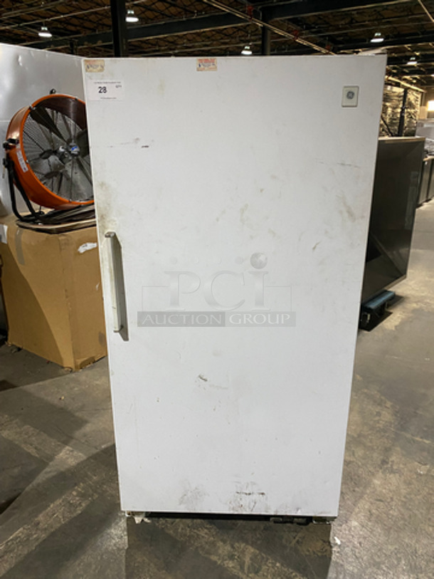 General Electric Commercial Single Door Reach In Freezer! With Shelves And Poly Coated Racks! Model: FUF17DACRWH SN: TT168914 100/115V 50/60HZ