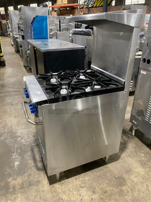 Montague Commercial Natural Gas Powered 4 Burner Stove! With Raised Back Splash And Salamander Shelf! With Oven Underneath! All Stainless Steel! On Legs! - Image 2 of 10