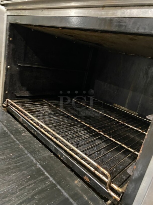 Stainless Steel Commercial Gas Powered 6 Burner Range w/ Oven, Over Shelf and Back Splash on Commercial Casters! - Image 7 of 9