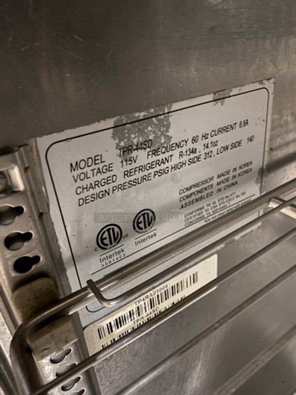 Nice! Turbo Air Commercial Refrigerated Pizza Prep Table! With Commercial Cutting Board! With Single Door Storage Space! Poly Coated Rack! All Stainless Steel! On Casters! Model: TPR44SD SN: TP4RA0100B 115V 60HZ 1 Phase! Working When Removed!  - Image 7 of 10