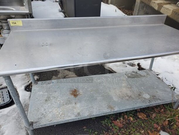 Stainless steel work table. 
