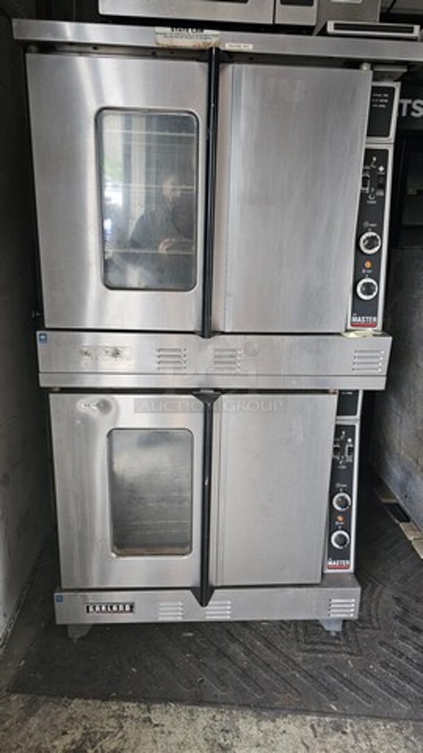 Garland Double Stack Natural Gas Oven (2X Bid) *missing racks in one oven* - Image 1 of 3
