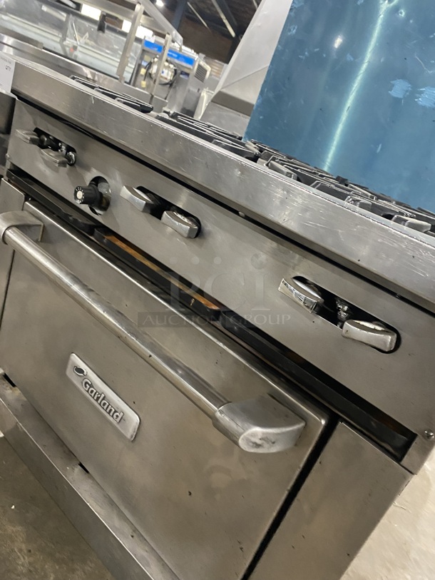 Garland Commercial Natural Gas Powered 6 Burner Stove! With Raised Back Splash! With Oven Underneath! Metal Oven Rack! All Stainless Steel! On Casters! - Image 8 of 9