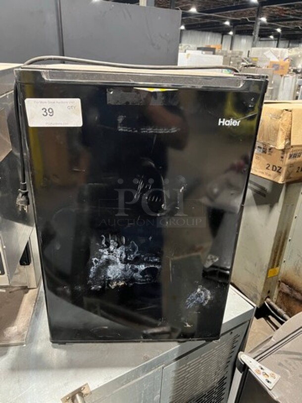 Haier Black Mini Fridge! With Poly Coated Racks And Shelves! Model: HC27SW20RB - Image 1 of 11