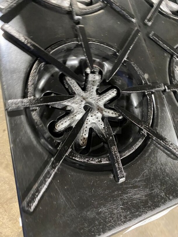 AMAZING! Garland Commercial Natural Gas Powered 6 Burner Split Top With Right Side Flat Griddle! With 2 Full Ovens Underneath! With Back Splash & Overhead Salamander Shelf! All Stainless Steel! With Metal Oven Racks! On Casters!  - Image 6 of 12